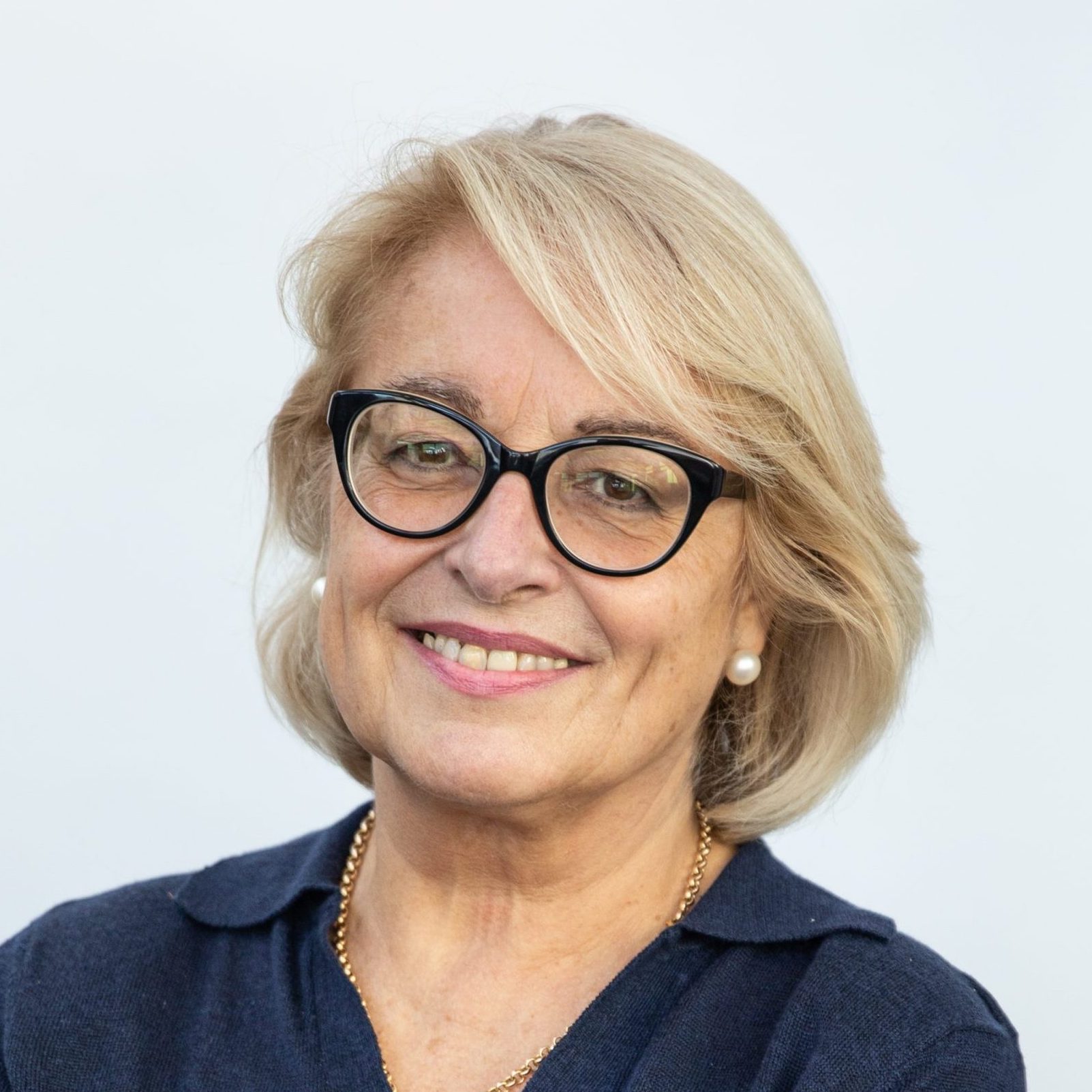 smiling female with glasses