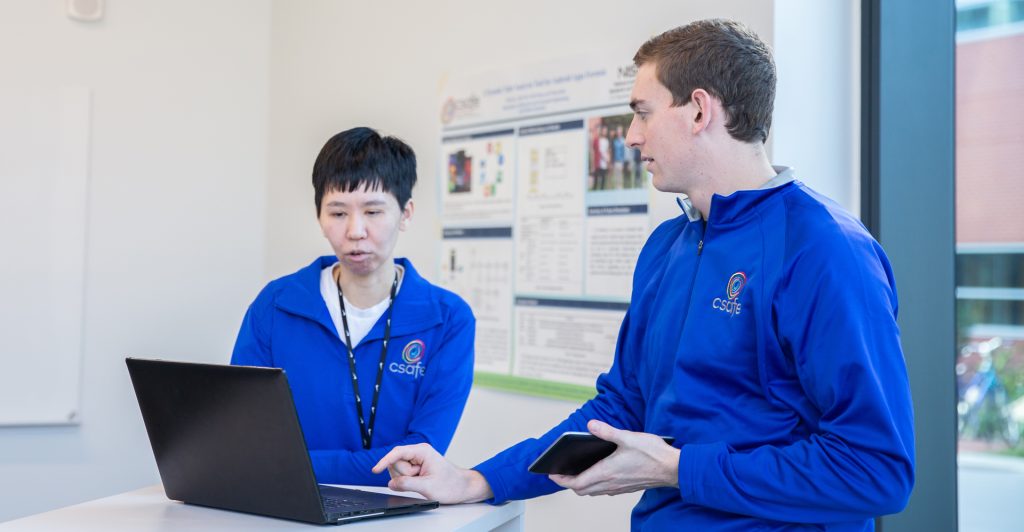 CSAFE student researcher Tyler Rebischke (right) was named outstanding senior in computer engineering during the fall 2022 semester. Rebischke is pictured with fellow EviHunter team member Chen Shi, a graduate student in electrical and computer engineering.