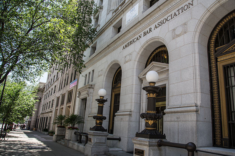 The American Bar Association building with ornate lamps and arched windows, seen from the street.