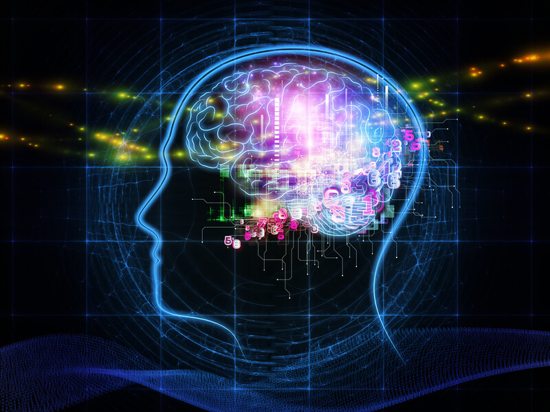 Glowing digital brain inside a human head outline with colorful lights and circuit patterns.