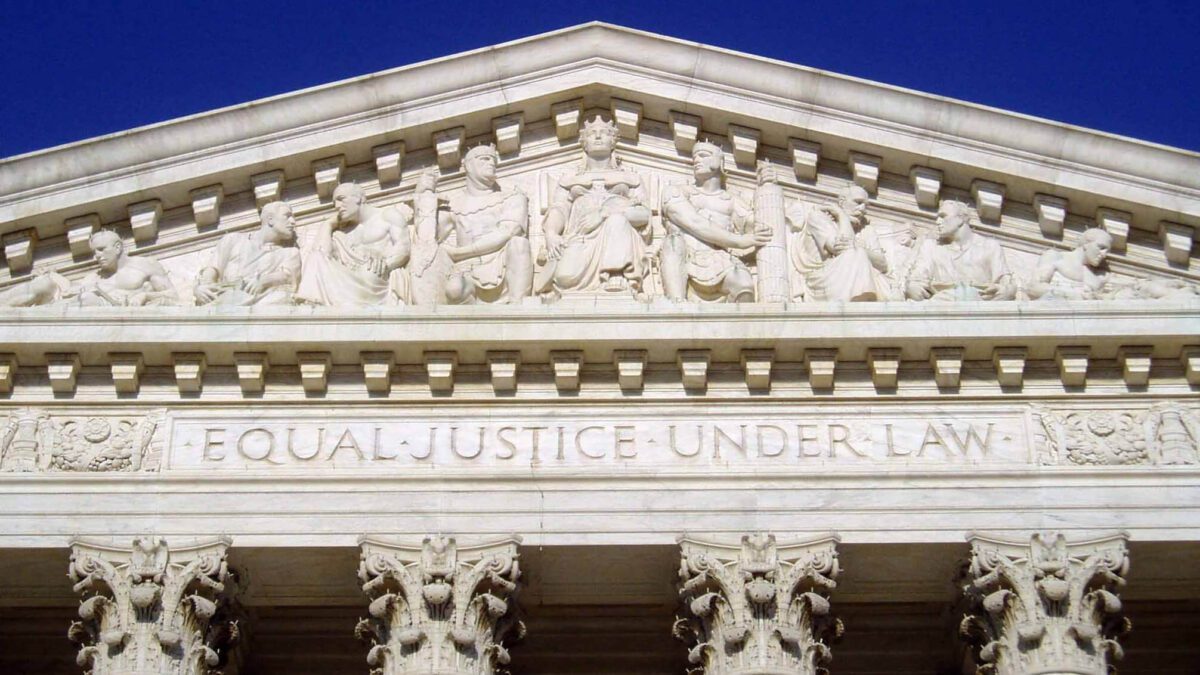 The Supreme Court building’s facade with the words “EQUAL JUSTICE UNDER LAW” engraved above columns.